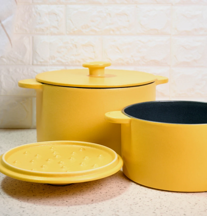 https://kuokokitchen.com/wp-content/uploads/dutch-oven-big-and-small-yellow-ceramic.webp